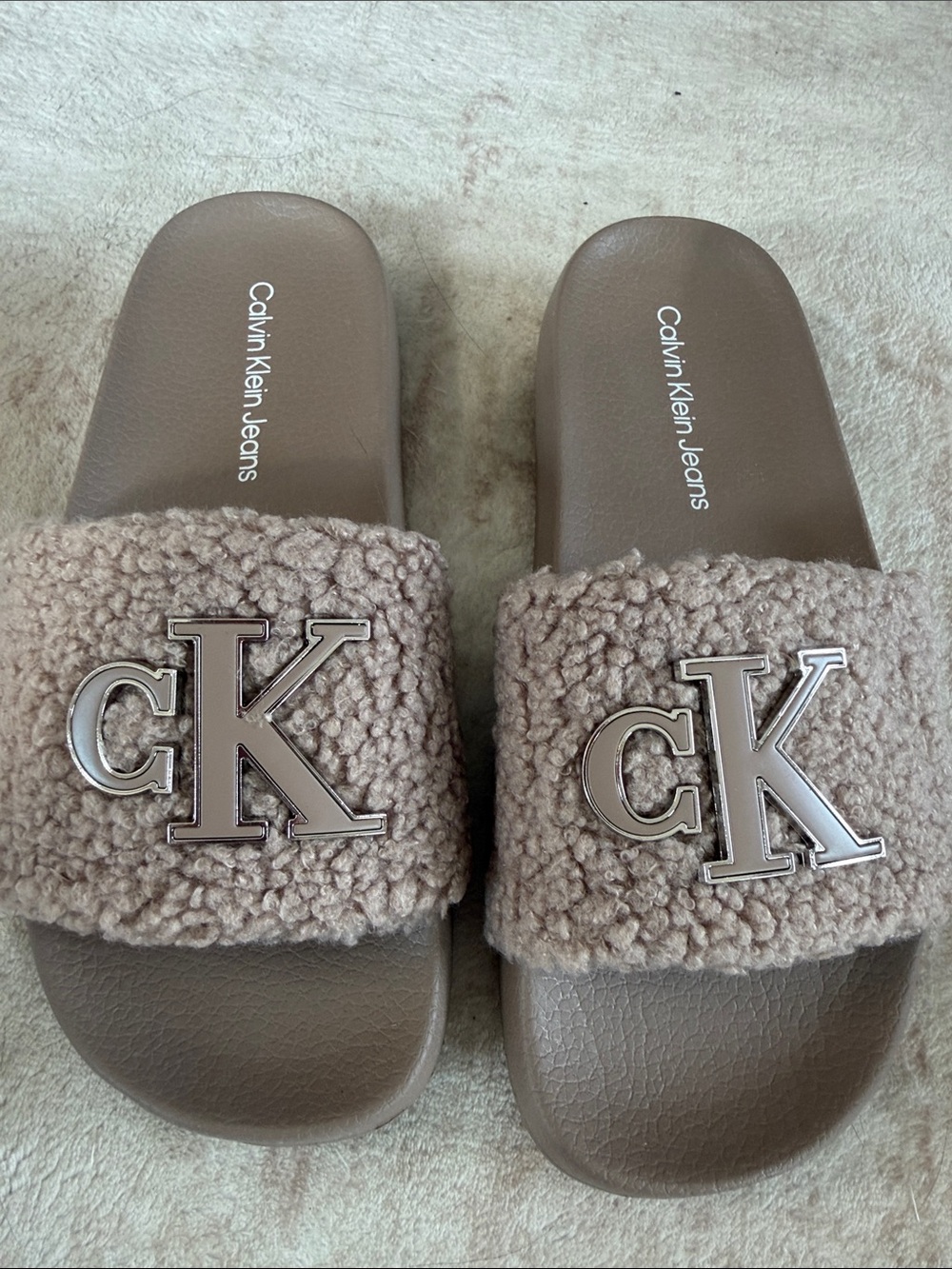 Calvin Klein AHVA Taupe Fuzzy Slide Sandals with Silver CK Logo